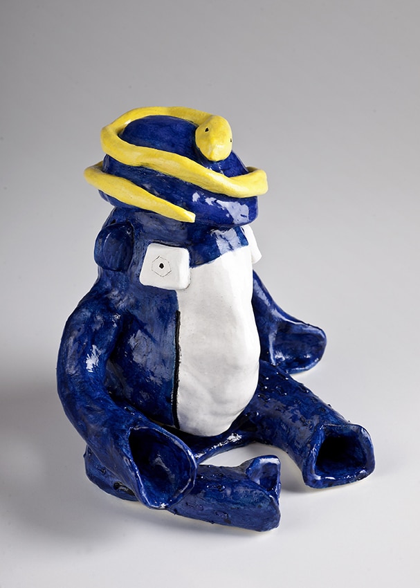 Blue Figure with Yellow Snake Hat