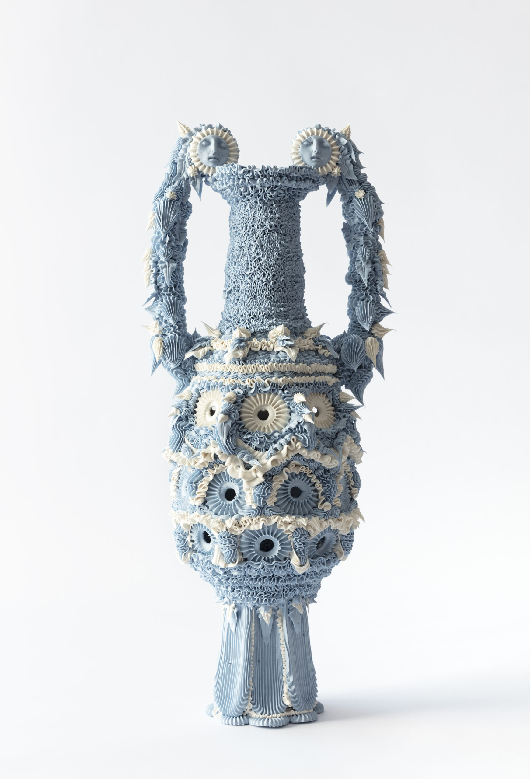 Superfluous Volute Urn with Poke holes